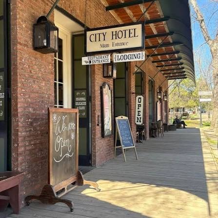 Columbia City Hotel main entrance with Restaurant and Lodging signs